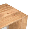 Close-up macro shot highlighting the rich linear grain patterns and organic mineral streaks of the solid wood tabletop