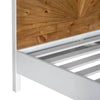 Close-up shot focusing on the intricate geometric wood plank pattern and natural grain variations