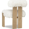 Rear angled view highlighting the seamless integration of the high-pile fabric with the natural wood base