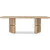 Front view of the Nelly rectangular dining table in a Lioness finish featuring a thick acacia wood top and chunky double pedestal legs