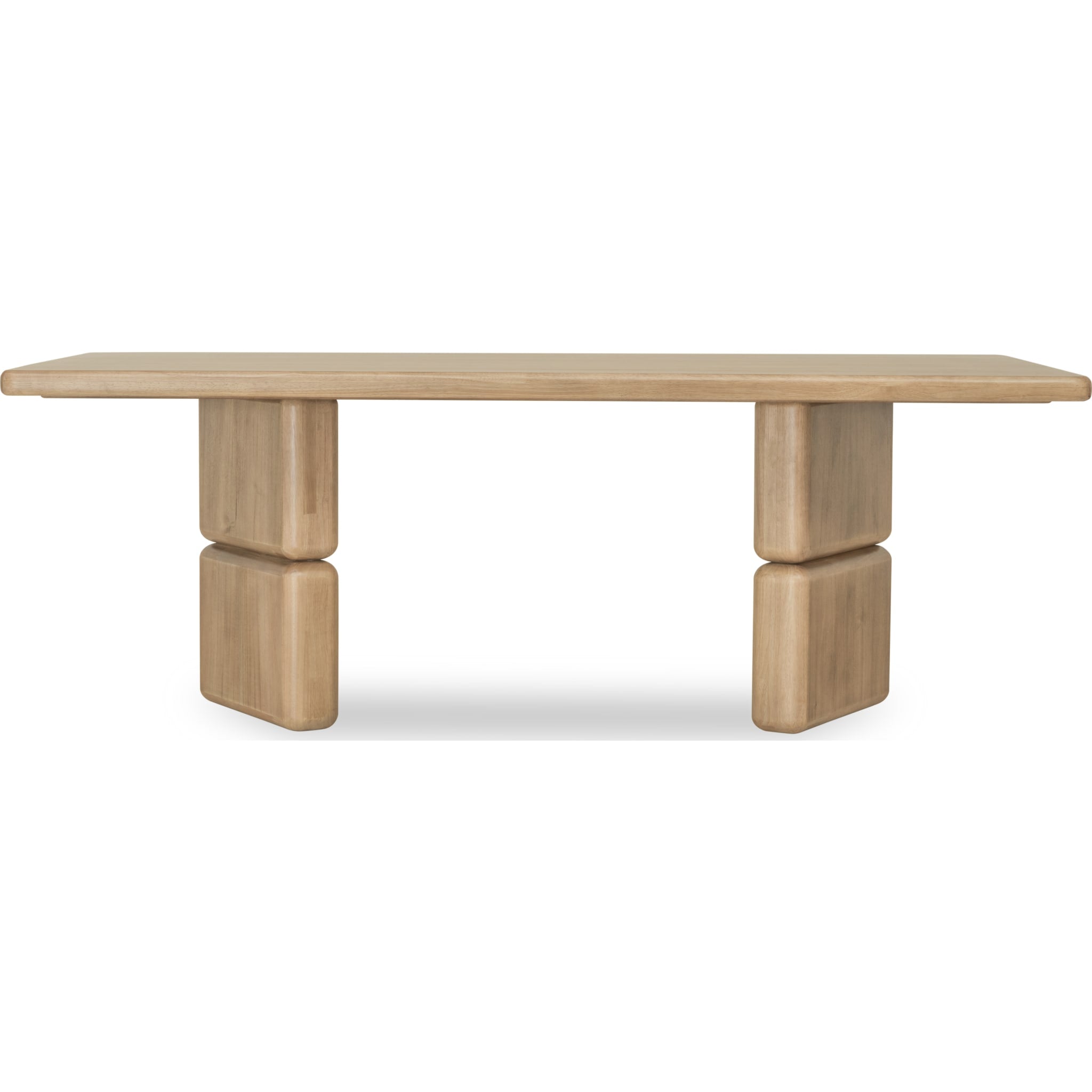 Front view of the Nelly rectangular dining table in a Lioness finish featuring a thick acacia wood top and chunky double pedestal legs
