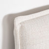 Close-up view showcasing the organic texture and soft light-reflecting qualities of the cream fabric