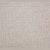 Detailed view of the durable neutral-toned fabric weave used for the Norell bed upholstery