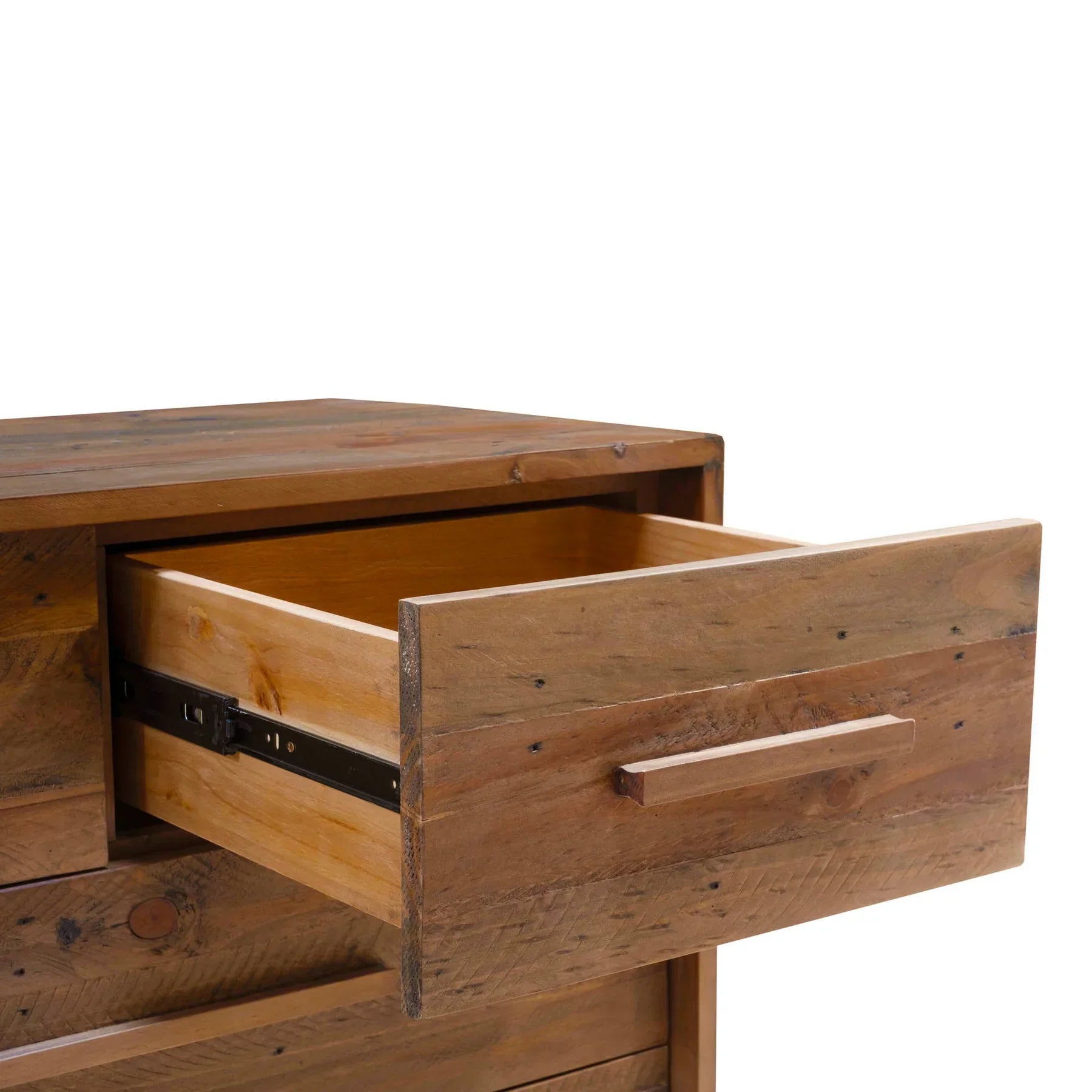 Close-up perspective of an open top drawer showcasing the smooth metal side glides and the high-quality internal wood construction