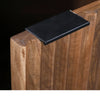 High-angle lifestyle shot featuring the nightstand in a bright industrial-style bedroom with a contemporary floor lamp