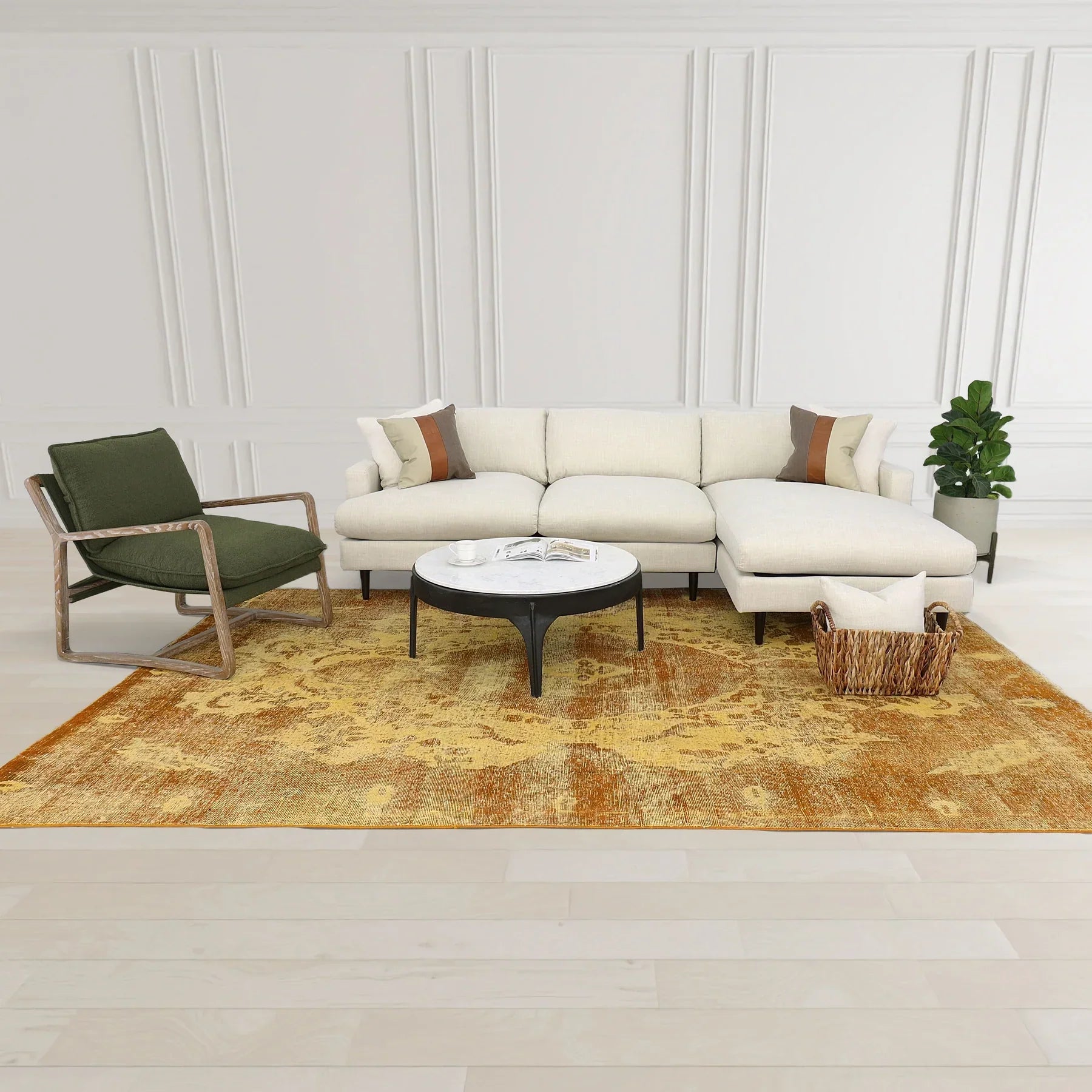 Front view of the Nila coffee table featuring a circular white marble top inset within a minimalist black wood frame