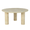 Alternative angled shot showcasing the organic pitted texture and consistent cream tone of the travertine pedestal legs