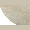 Close-up perspective of the circular tabletop surface showcasing natural stone variations and earthy cream hues