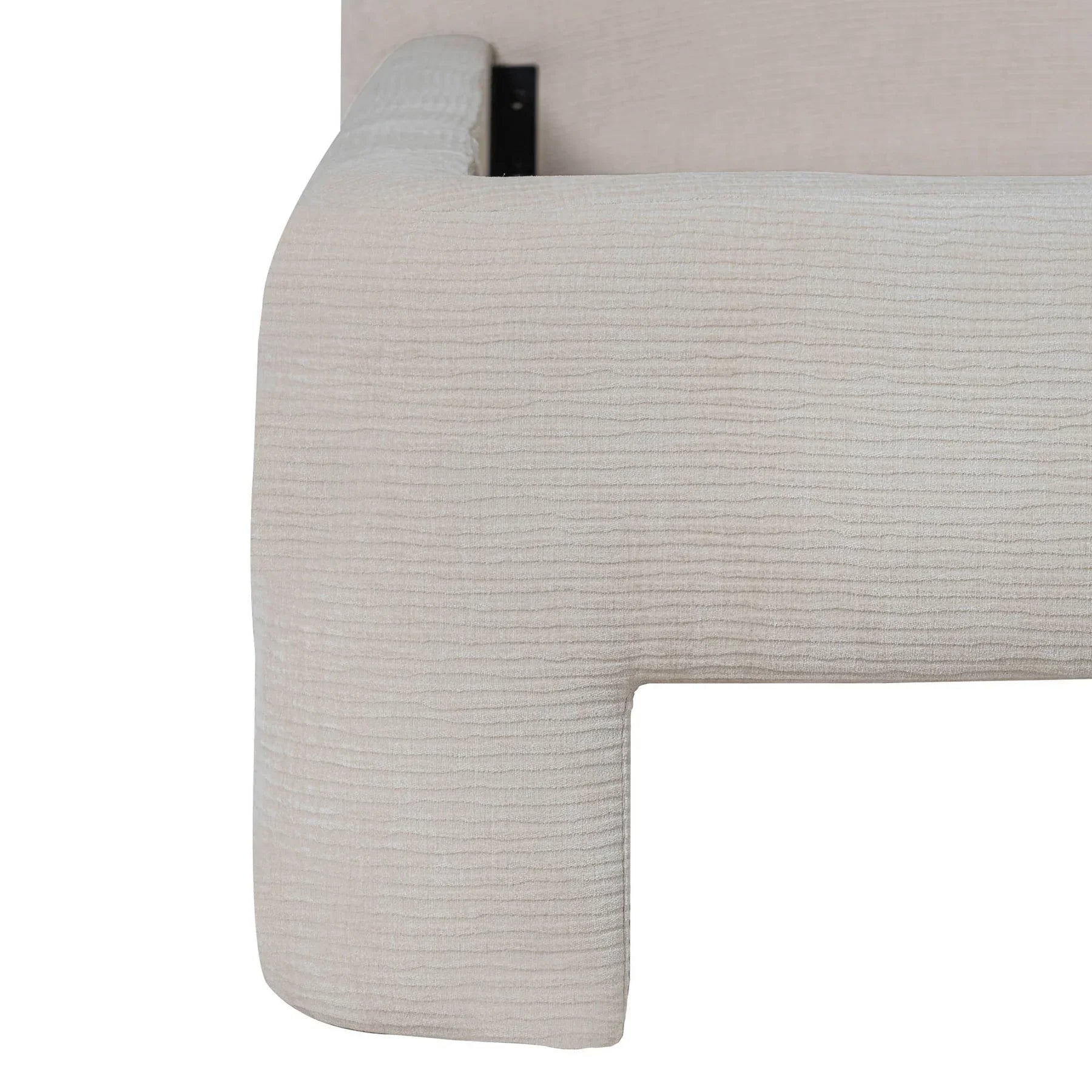Detailed view focusing on the soft rounded edges and high-quality tailoring of the upholstered platform base