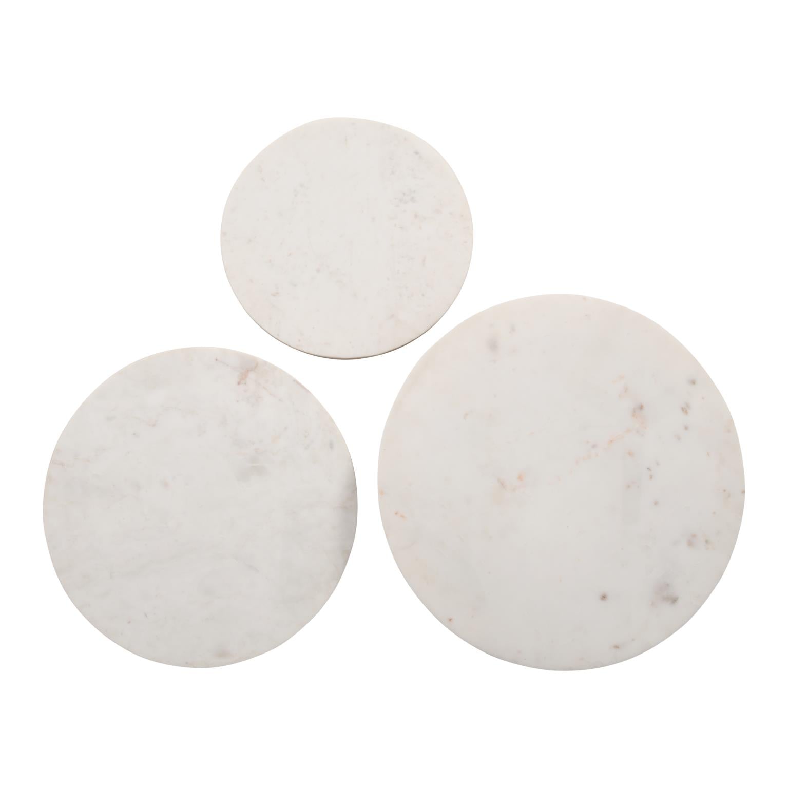 Direct overhead view of the three circular white marble tabletops showcasing unique grey veining patterns on each piece