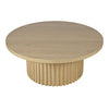 Three-quarter perspective highlighting the architectural silhouette and the seamless vertical slats of the pedestal base