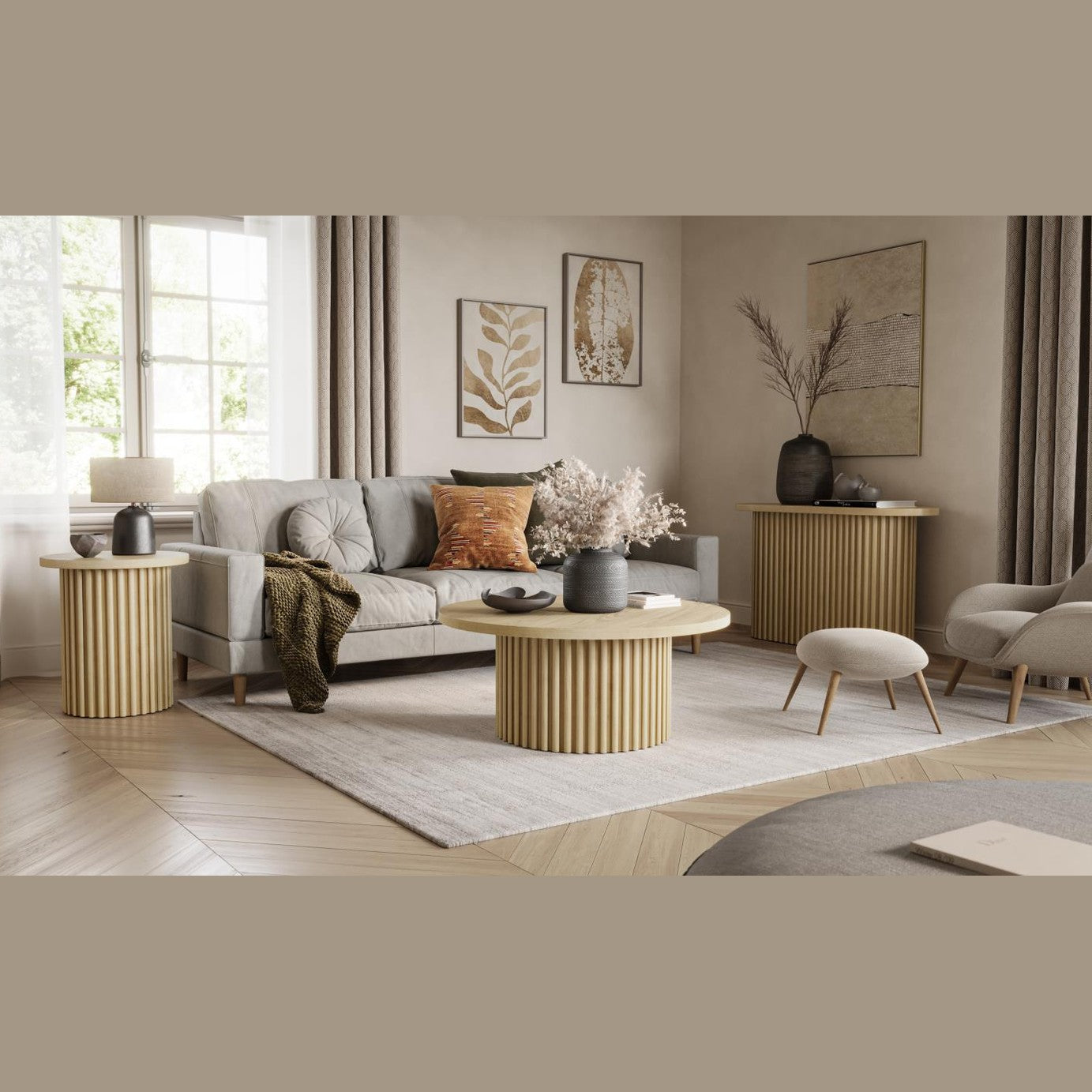 Lifestyle shot featuring the Nord coffee table styled in a neutral modern living room with matching oak accent furniture