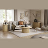 Lifestyle shot featuring the Nord end table styled in a contemporary living room next to a grey sofa to demonstrate scale