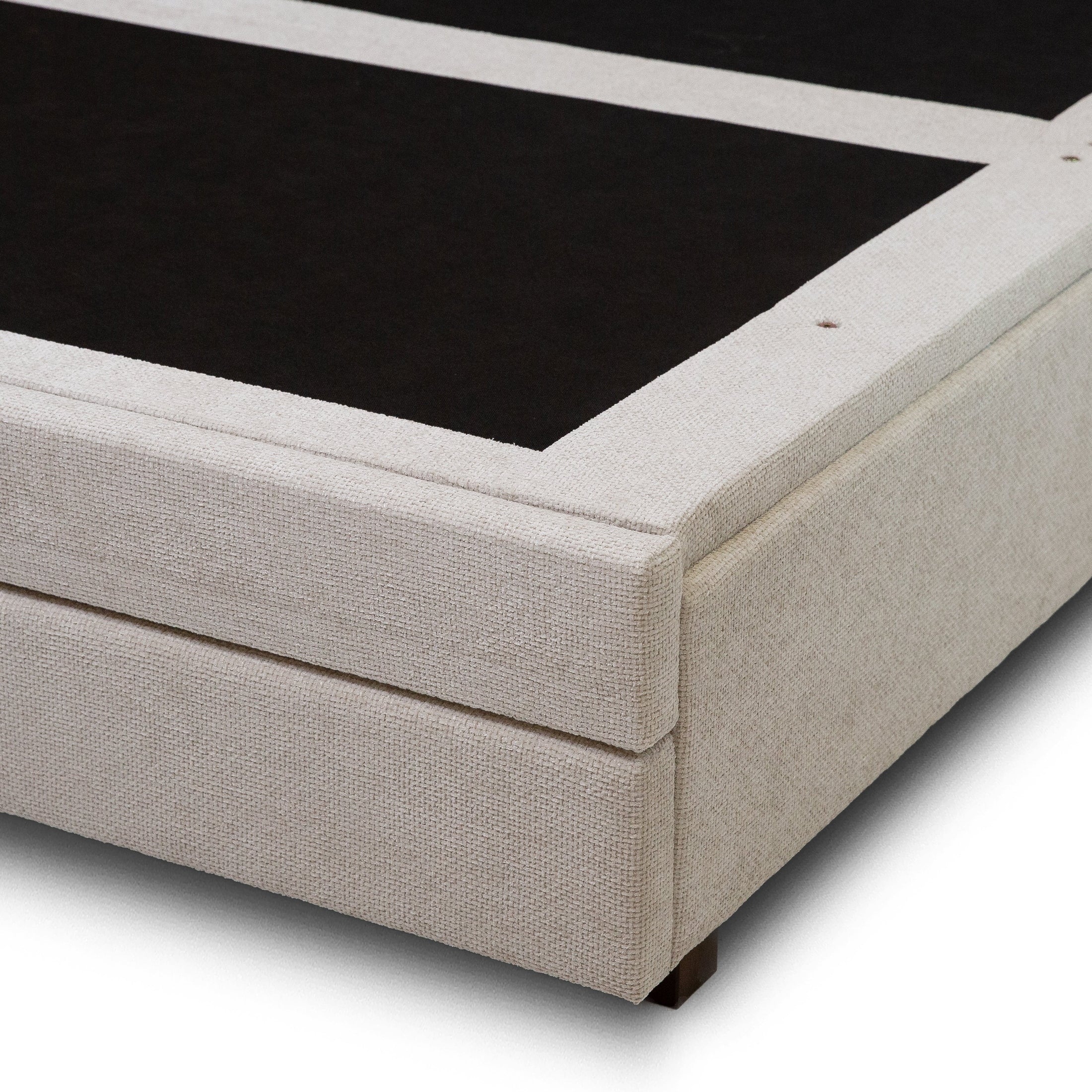 Front view of the Norell storage bed featuring a neutral woven fabric finish and a vertical channel tufted headboard