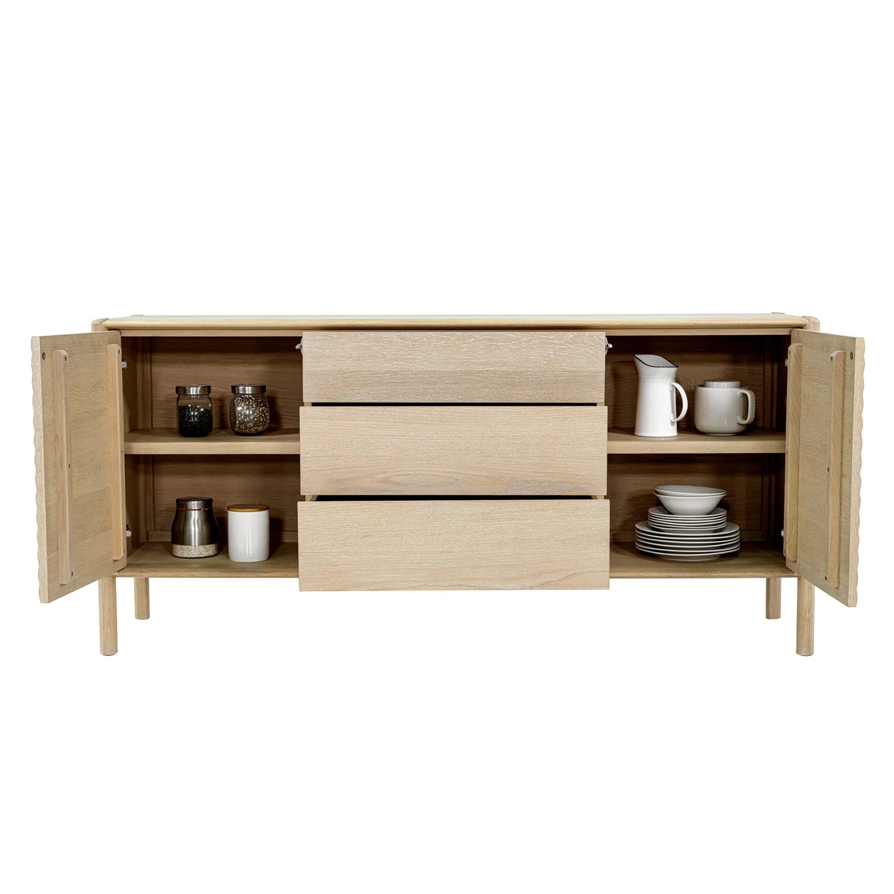 Front view with doors open showing the internal storage capacity styled with white ceramic dinnerware and kitchen accessories