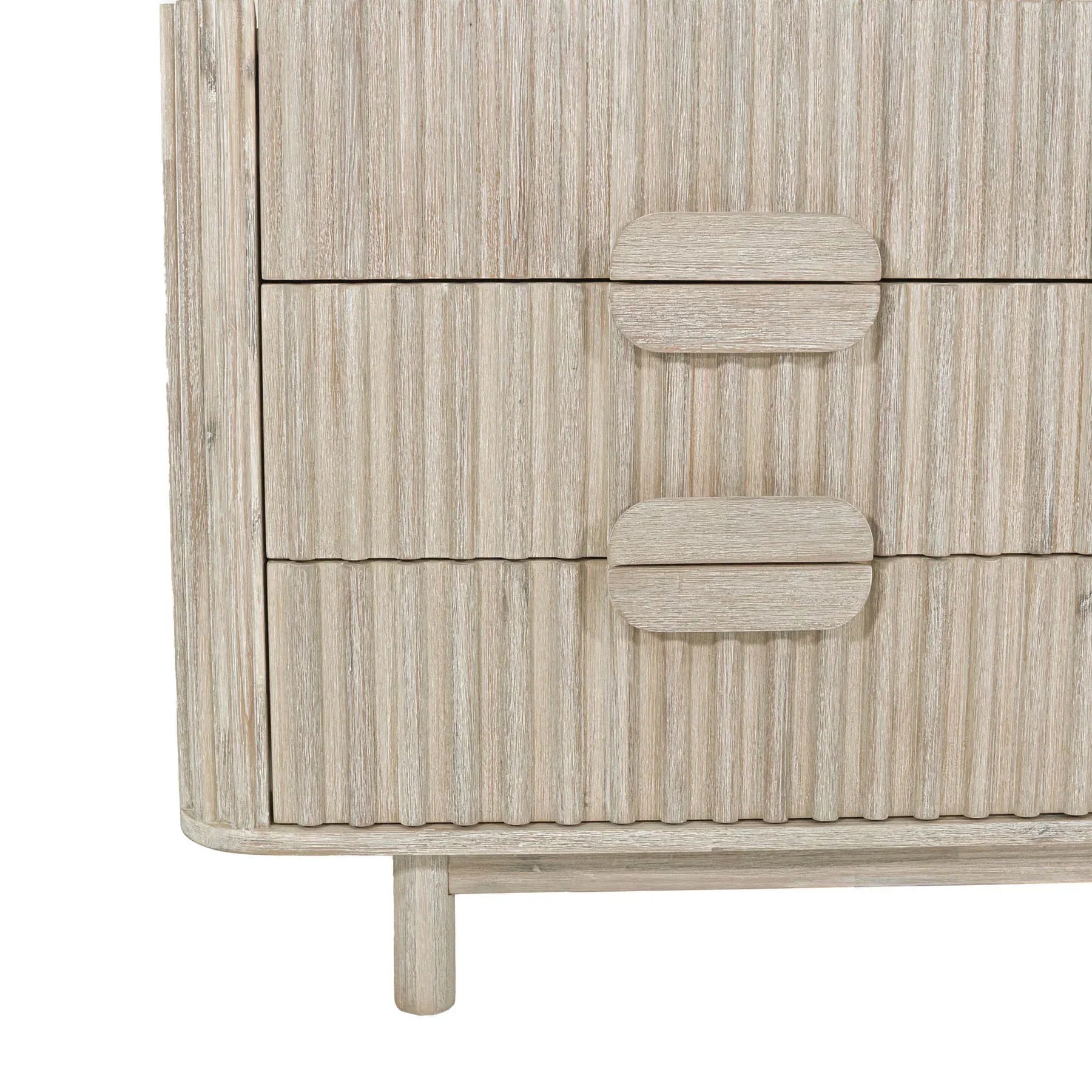 Front view of the Oasis 6-drawer dresser in a light bleached oak finish featuring vertical fluted wood detailing and integrated oval handles
