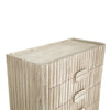 Deep perspective view emphasizing the compact vertical footprint of the 4-drawer chest in a gallery setting