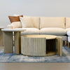 Product shot featuring the Oasis coffee table paired with the matching smaller ribbed side table
