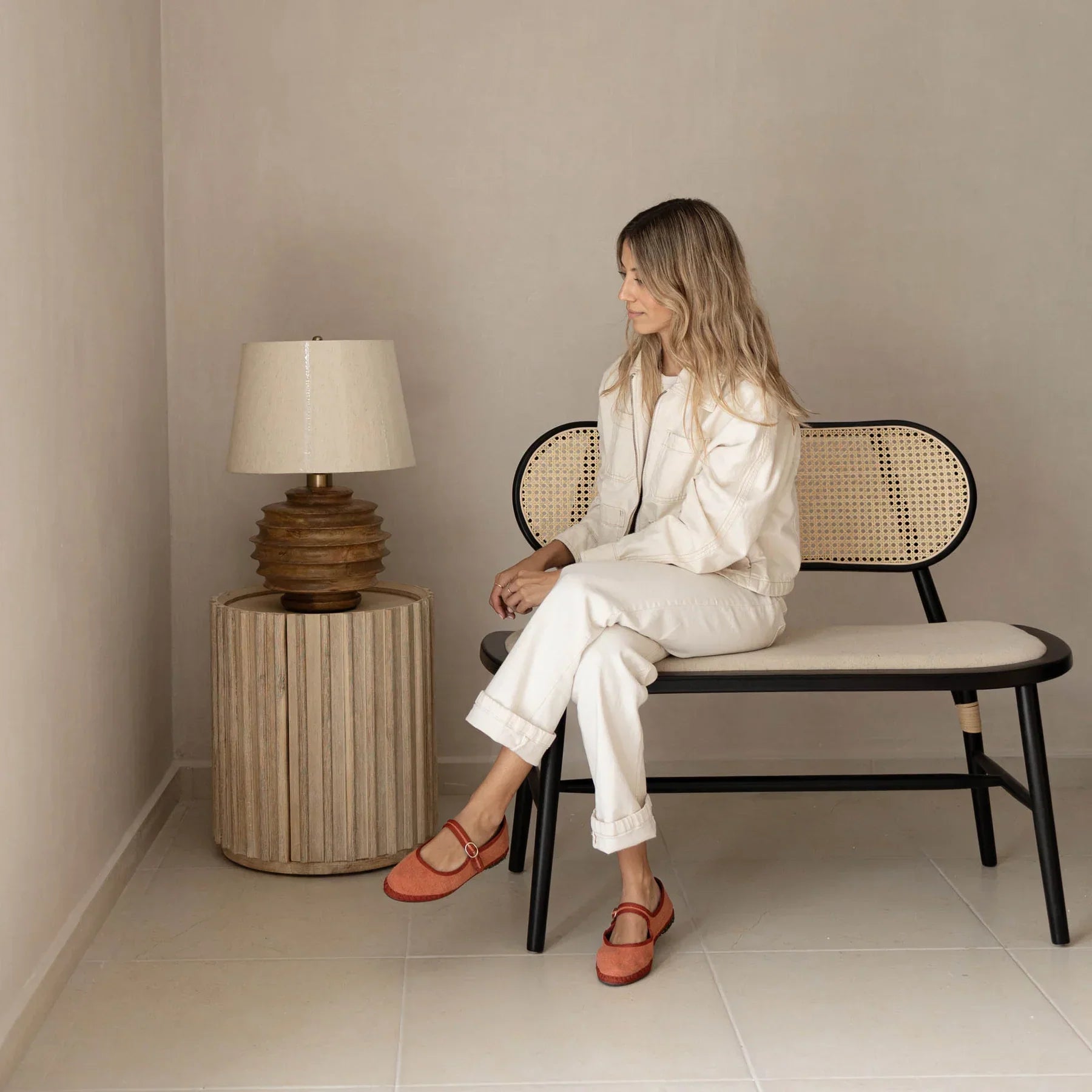 Front view of the Oasis drum-style side table featuring a vertical ribbed texture and a light oak wood finish