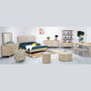 Wide lifestyle view showing the Oasis coffee table integrated into a full bedroom suite with matching ribbed furniture