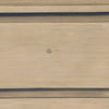 Macro detail shot showcasing the natural wood grain variations and the soft sand-toned finish of the Opera collection