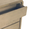 Macro detail shot inside an open drawer highlighting the authentic wood texture and precision structural joinery