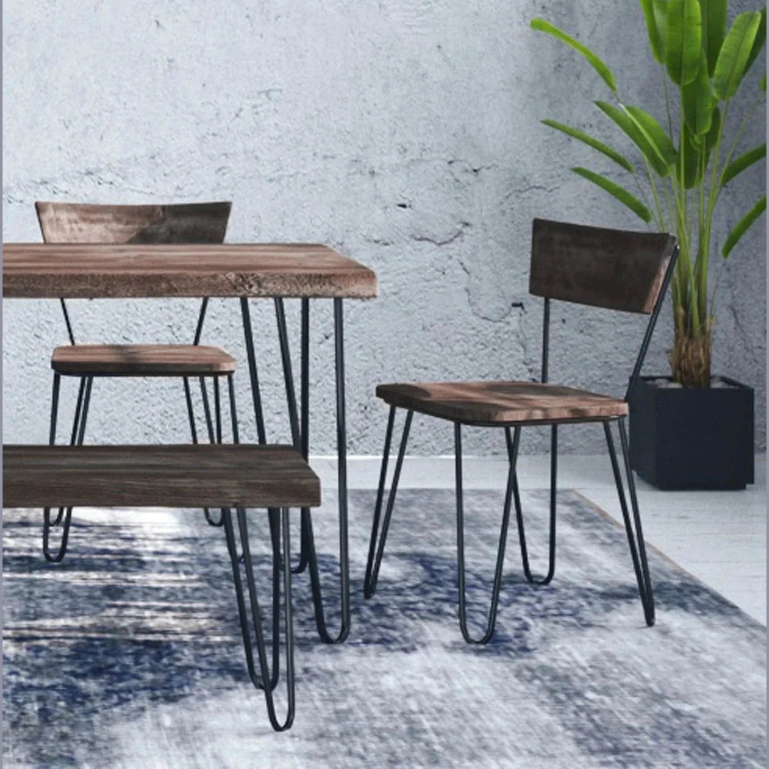 Front view of the Organic chair featuring a solid wood seat and backrest with black metal hairpin legs