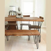 Lifestyle view of the Organic matte brown bench styled as a functional accent piece in a modern minimalist entryway