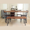 Close-up lifestyle perspective focusing on the natural wood grain of the Organic bench within a complete dining set