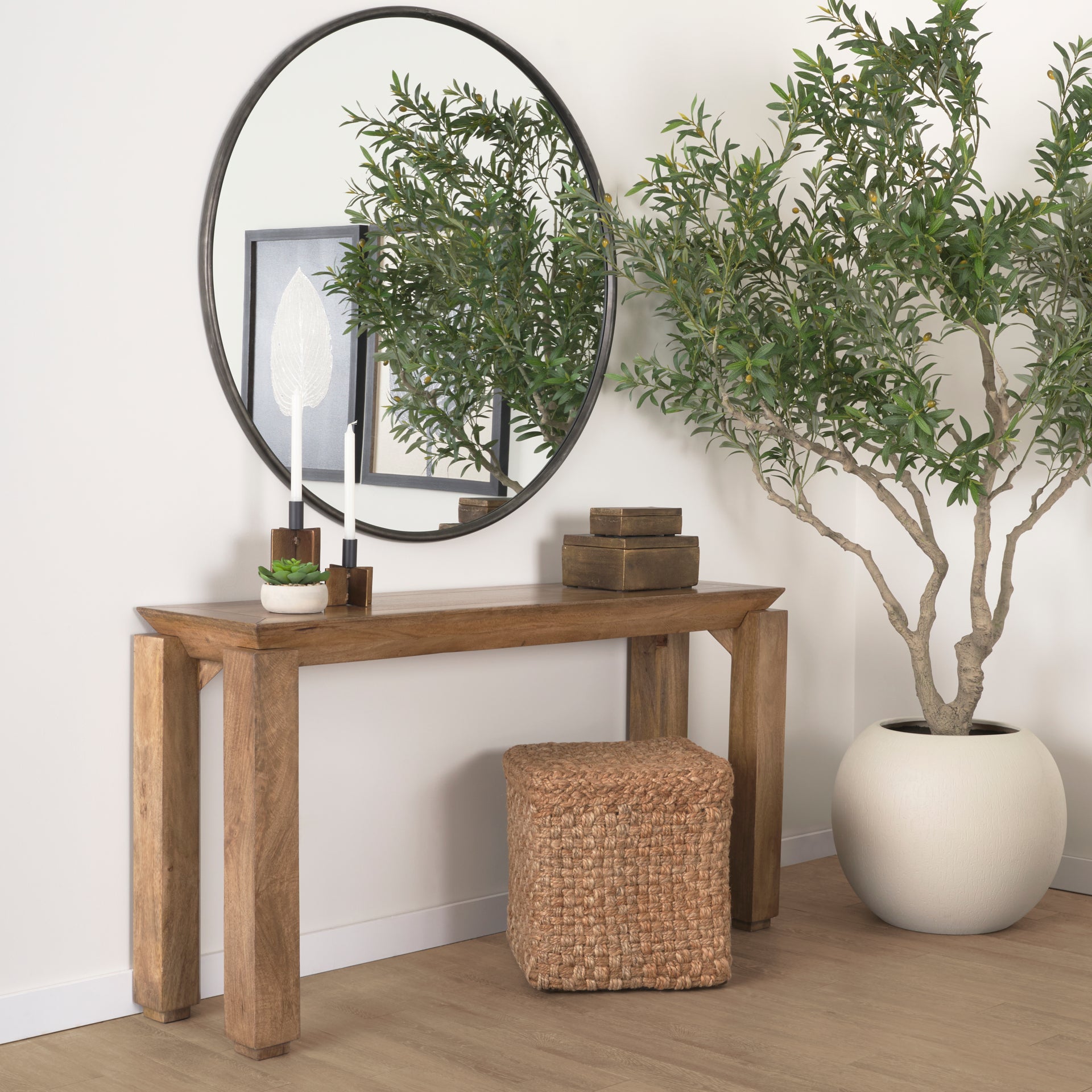 Front view of the Sapphira console table in a rich brown wood finish featuring a thick rectangular top and architectural block legs