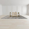 Lifestyle shot of the small natural rattan sideboard styled with plants in a bright, minimalist room setting