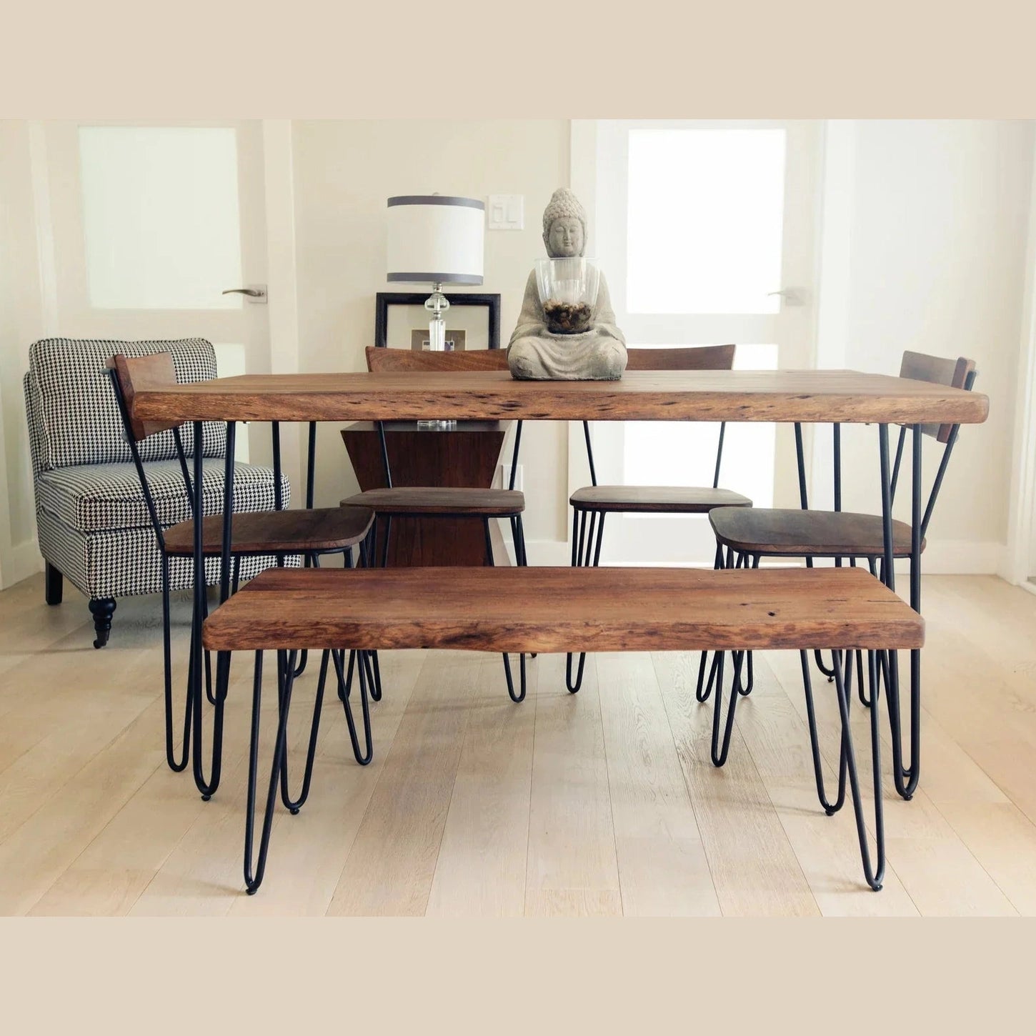 Front view of the Organic chair featuring a solid wood seat and backrest with black metal hairpin legs