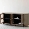 Perspective view with side doors open showcasing internal shelving organized with decorative books and accessories