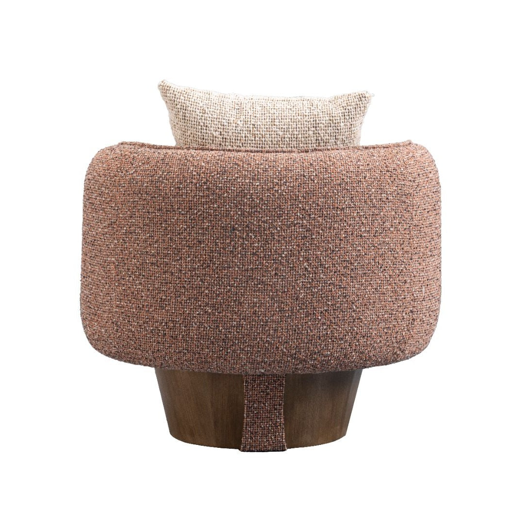 Front view of the Ovolo chair in rust-toned textured bouclé featuring integrated wood petal armrests and a tapered walnut swivel base