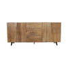 Front view of the Peyton sideboard featuring natural mango wood construction with unique geometric carved door panels and black metal legs