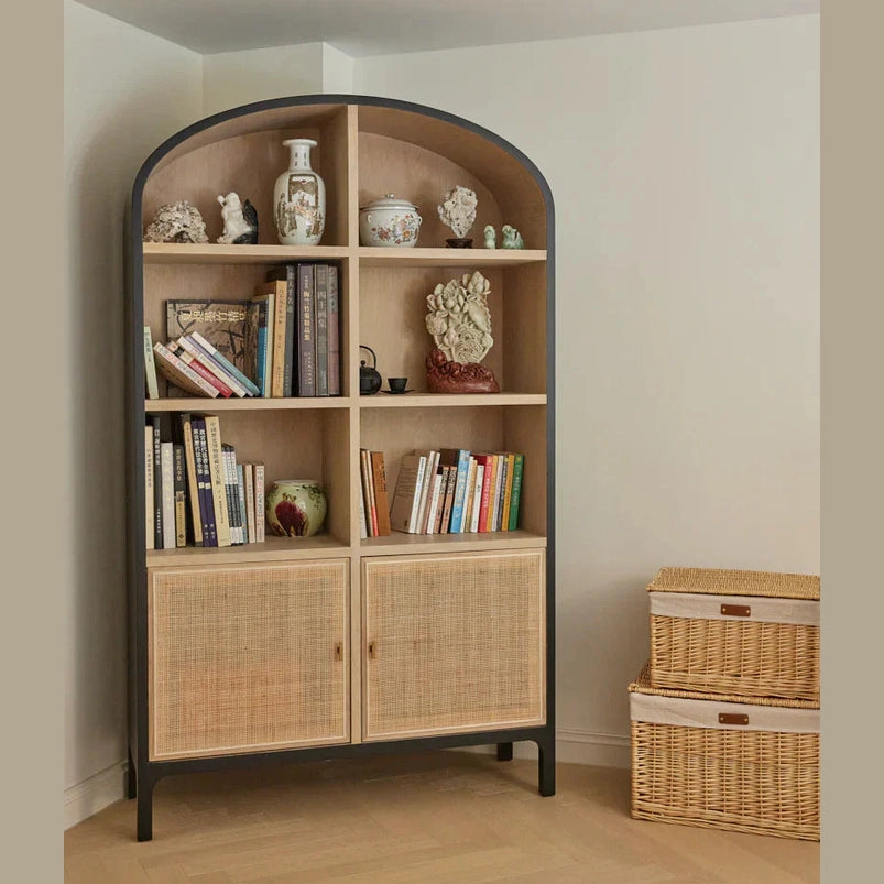Straight-on front view showcasing the symmetrical six-compartment open shelving and lower cane-front storage