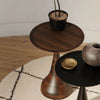 Wide lifestyle view demonstrating the table's scale within a contemporary living space featuring minimalist seating