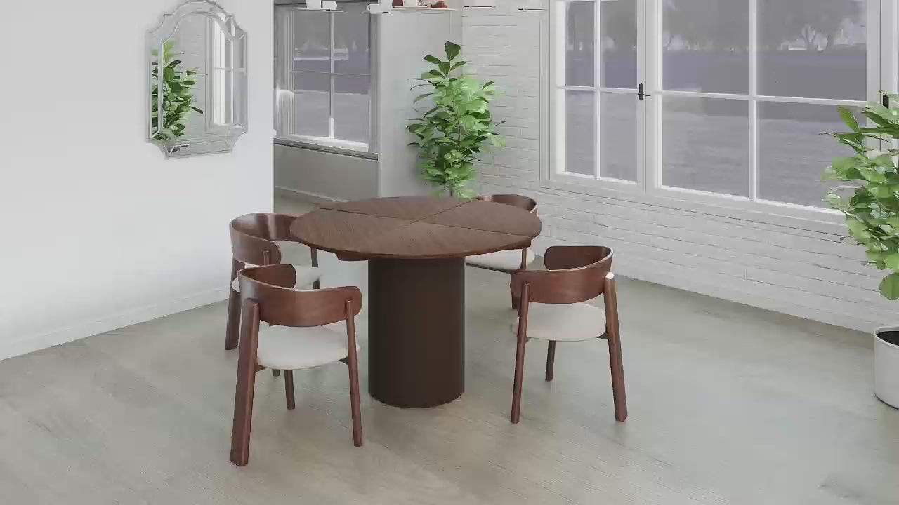 Front view of the Alter round dining table in a sleek black finish featuring a sturdy cylindrical pedestal base
