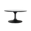 Side profile view highlighting the slender neck and flared silhouette of the black metal tulip base