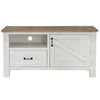 Front view of the Provence small media unit featuring a distressed white finish, a natural wood top, and a sliding barn door with black hardware