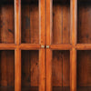 Detailed view of the interior shelving showcasing the fixed wood shelves and spacious storage compartments