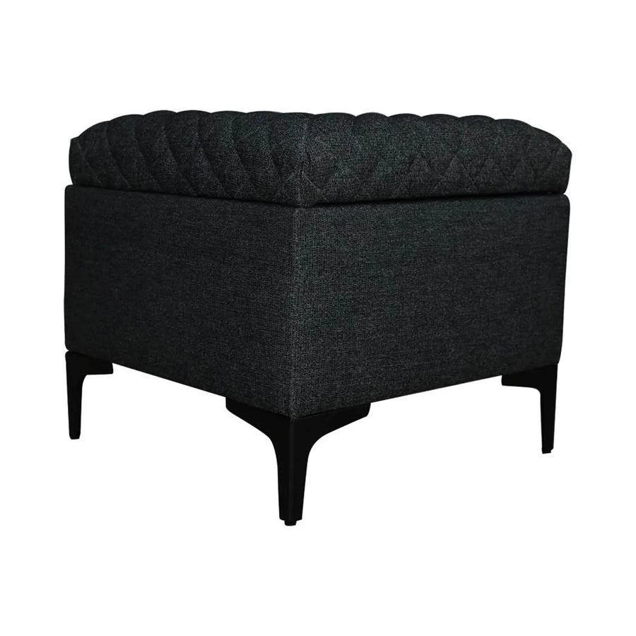 Front three-quarter view of the Reece square storage ottoman in black fabric featuring a diamond-quilted tufted lid