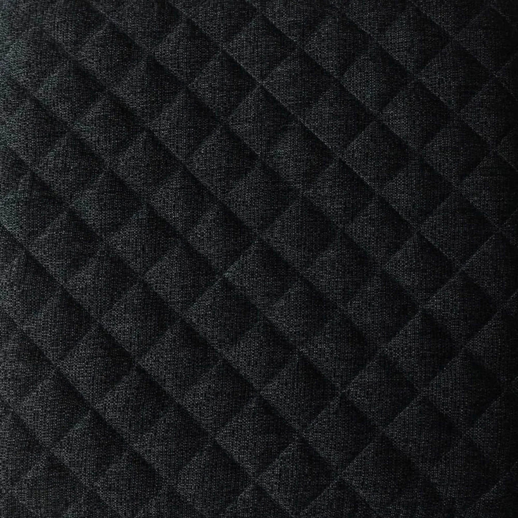Front three-quarter view of the Reece square storage ottoman in black fabric featuring a diamond-quilted tufted lid