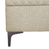 Detailed view of the sleek dark metal corner leg supporting the upholstered frame of the Reece bench