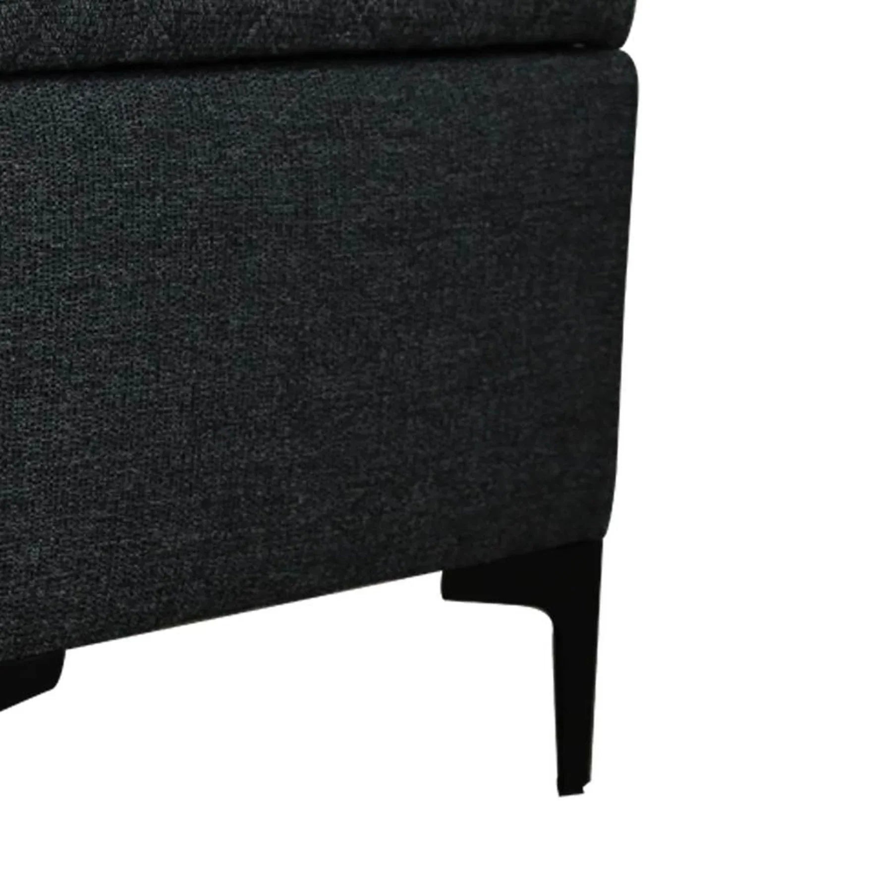 Front three-quarter view of the Reece square storage ottoman in black fabric featuring a diamond-quilted tufted lid