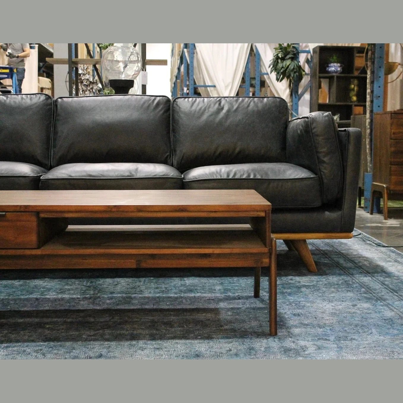 Alternative lifestyle shot showing the coffee table in a spacious loft setting with industrial accents