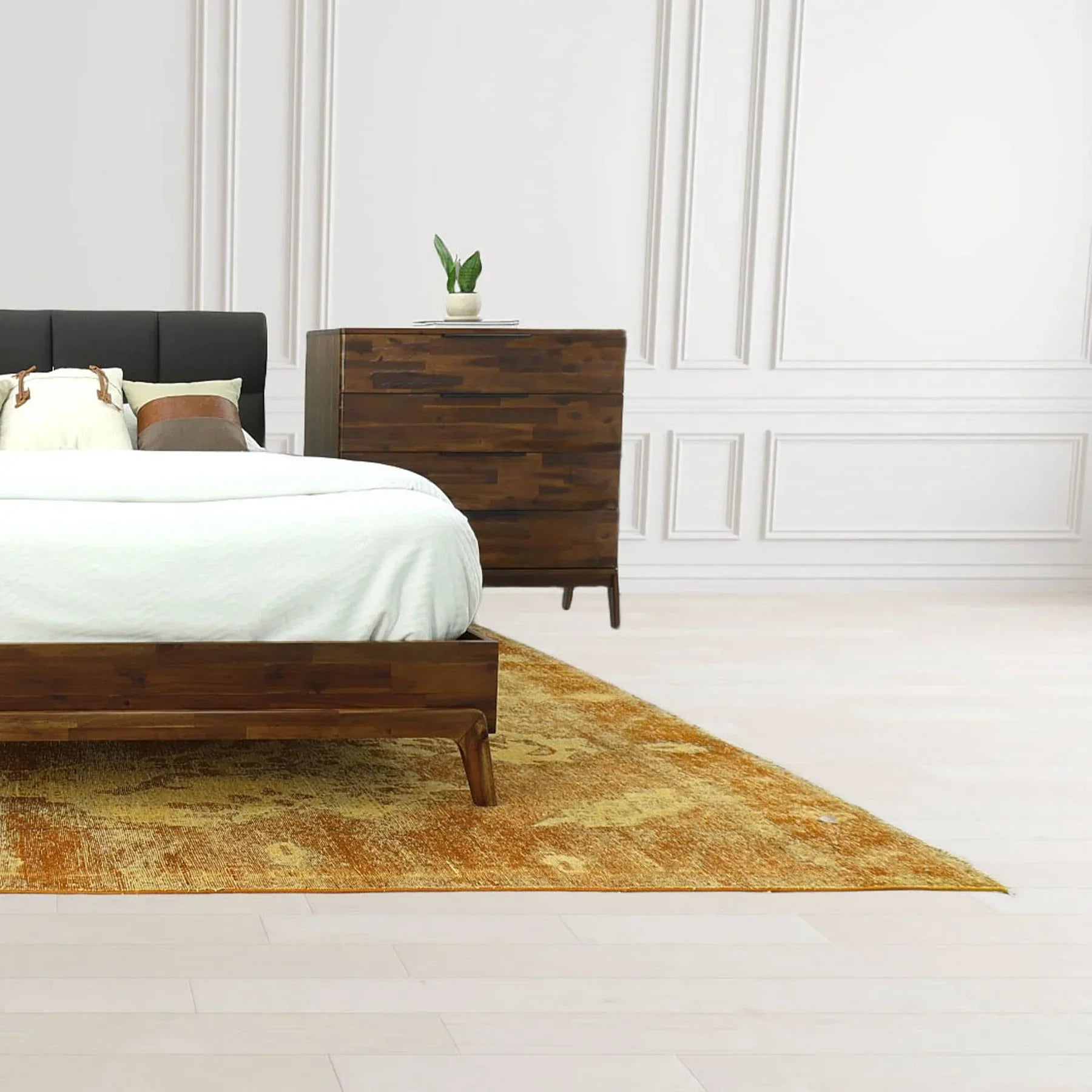 Studio lifestyle shot featuring the Remix 4-drawer chest styled in a bright, modern bedroom setting