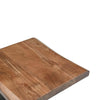 Close-up overhead shot focusing on the unique organic edge and the rich multi-tonal wood grain of the tabletop