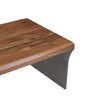 Close-up shot focusing on the smooth surface and natural warm wood tones of the acacia tabletop