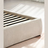 Close-up shot of the rounded sideboard corner highlighting the precise spacing of the vertical chestnut slats